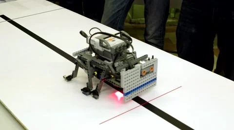 Electronic mechanical beetle walks along the track. DIY hand made toy. Stock Footage 58506541