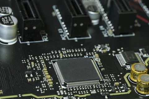 Electronic micro chip on hi tech pc motherboard,computer components chip Stock-Fotos