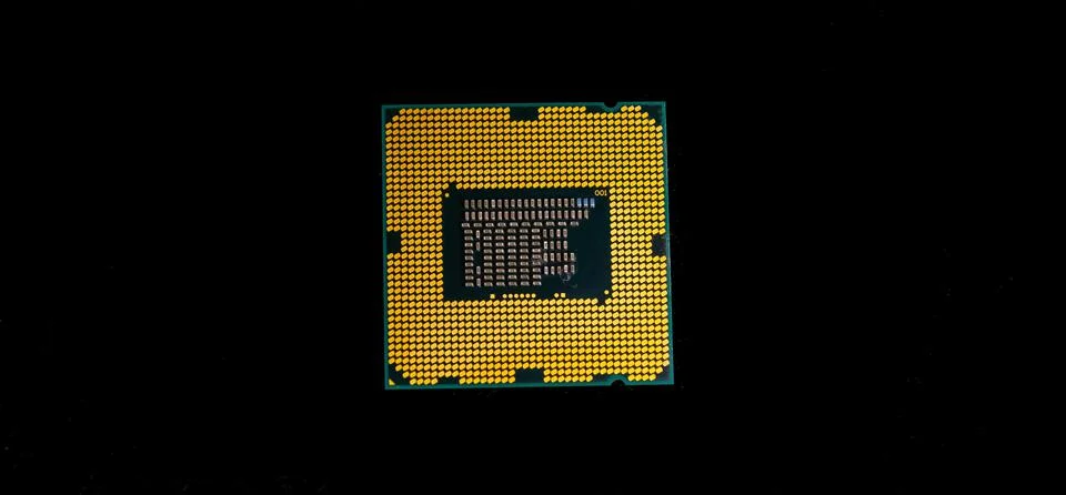 Electronic microchip on the black background Stock Photos