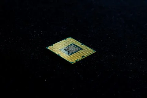 Electronic microchip on the black background Stock Photos