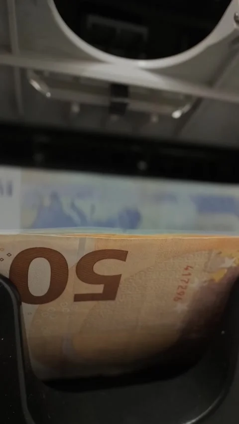 Electronic money counter machine processing 50 Euro bills. Banking concept. Stock Footage 331504297