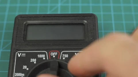 Electronic multimeter tool power on. And measuring voltage test. Close up Video stock 128820400