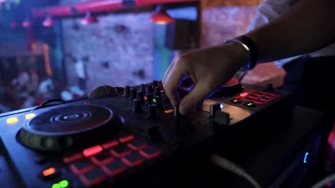 Electronic Music DJ Playing Live at Nightclub Stock Footage 325801975