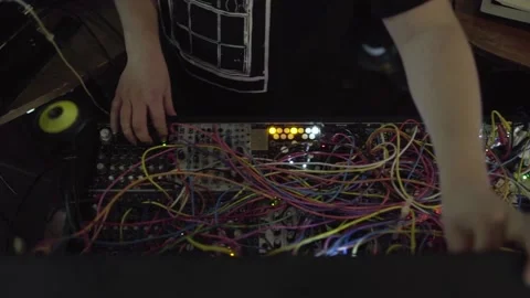 Electronic musician twisting knobs Vídeo Stock 229578936