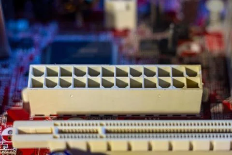 Electronic part of a desktop pc mainboard showing plastic socket with pins Stock Photos