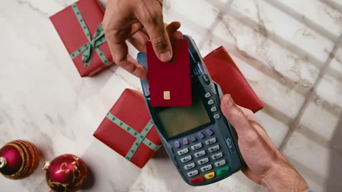 Electronic payment by card the POS for Christmas gift item during Black Friday Stock Footage 320393385