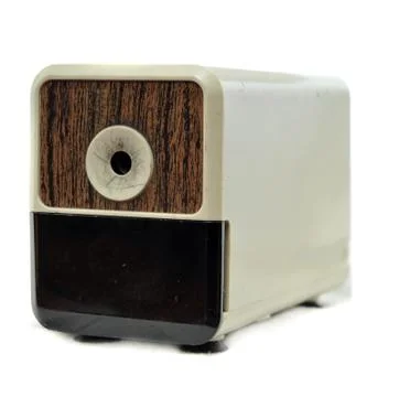 Electronic pencil sharpener isolated on white background with wooden face pla Stock Photos