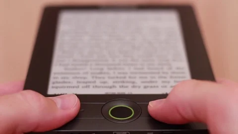 Electronic pocket book. Thumbing through closeup 動画素材 83533959