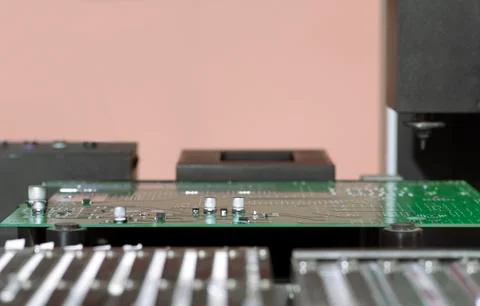 Electronic printed circuit Board on the table of the robot manipulator Stock Photos
