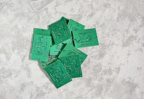 Electronic printed circuit boards on a light background. Stock Photos