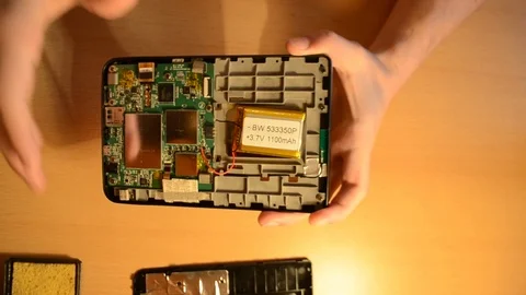 Electronic repairing process using solder and multimeter. V2 Stock Footage 92071802