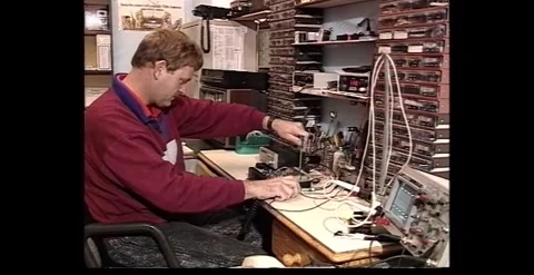Electronic Repairs on Workbench – 1990s Stock-Footage 318947217
