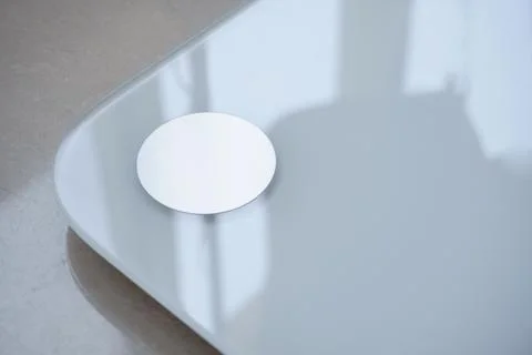Electronic Scale on marble floor Stock Photos