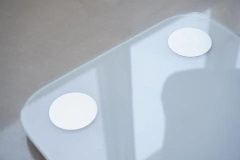 Electronic Scale on marble floor Stock Photos