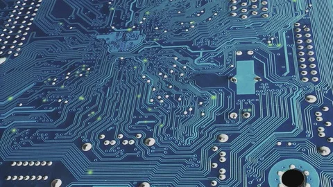 Electronic signal move along the surface tracks of the blue circuit board Stock Footage 127470522