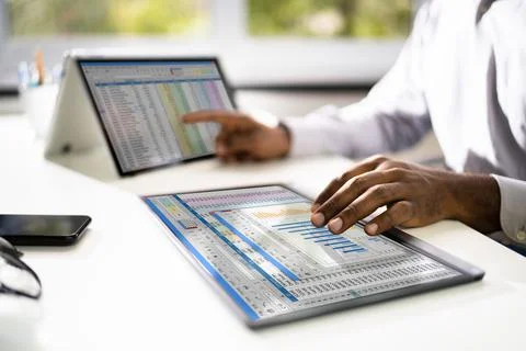 Electronic Spreadsheet Analyst Or Auditor Using Software Stock Photos