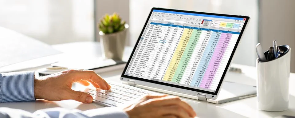 Electronic Spreadsheet Analyst Or Auditor Using Software Stock Photos