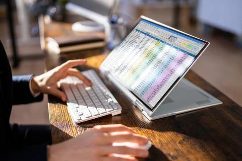 Electronic Spreadsheet Analyst Or Auditor Using Software Stock Photos