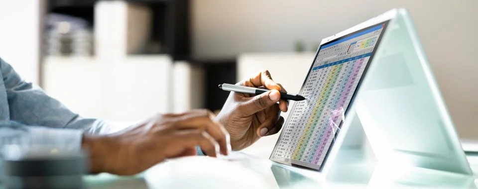 Electronic Spreadsheet Analyst Or Auditor Using Software Stock Photos