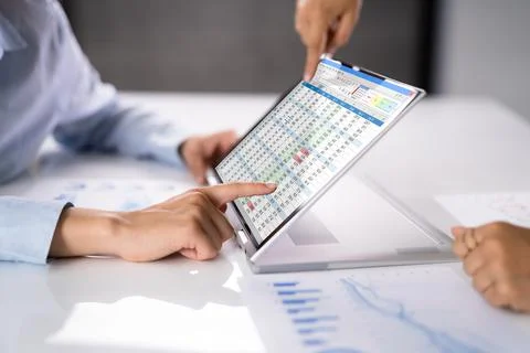 Electronic Spreadsheet Analyst Or Auditor Using Software Stock Photos