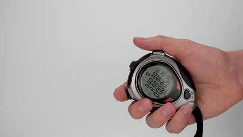 Electronic stopwatch in hand. Stock Footage 153259057