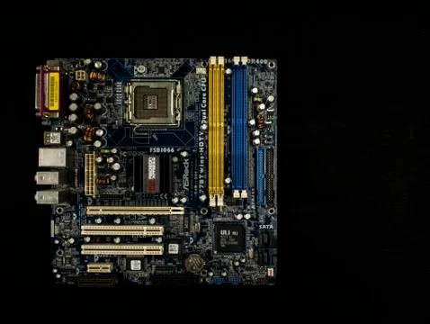 Electronic system of a computer motherboard, digital chip with a transistor Stock Photos