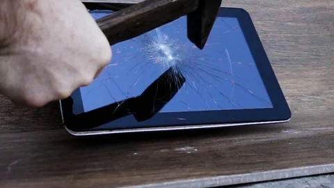 Electronic tablet break with a hammer. Stock Footage 89279946