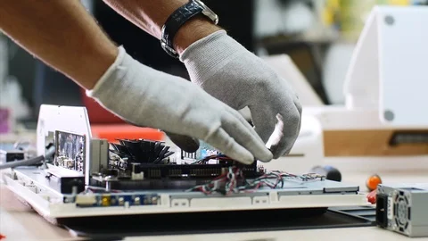 Electronic technician detach RAM memory from monoblock in repair workshop. Stock Footage 114739106