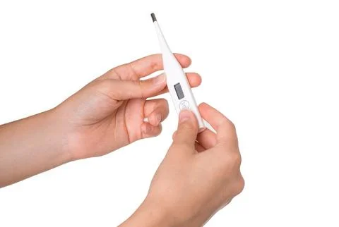 Electronic thermometer in hands on a white background Stock Photos