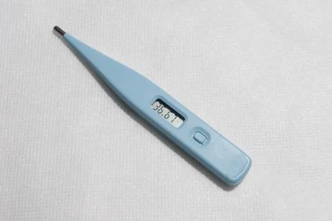 Electronic thermometer shows temperature 36,6 Stock Photos