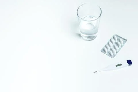 Electronic thermometer on a white table Fotos de archivo