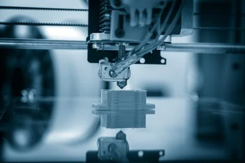 Electronic three dimensional plastic printer during work , 3D , printing. Stock Photos