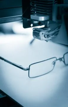 Electronic three dimensional plastic printer during work , 3D printer. Stock Photos