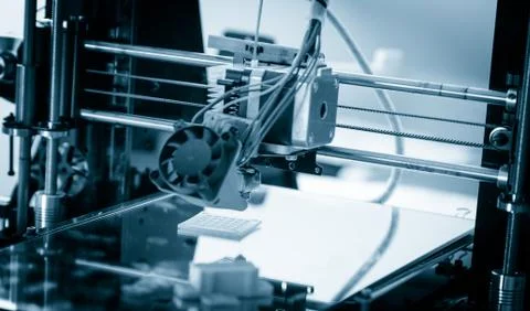 Electronic three dimensional plastic printer during work , 3D printing Stock Photos