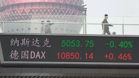 Electronic ticker board and Oriental Pearl Tower in Shanghai, China Stock Footage 67546754