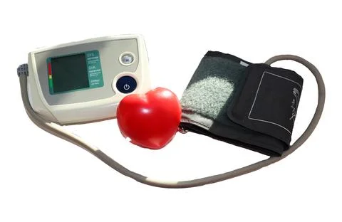 Electronic tonometer with the display turned off, with a cuff and a hand-he.. Stock Photos