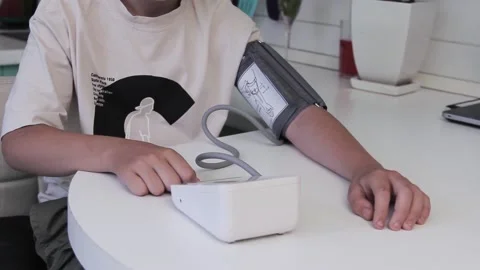 Electronic tonometer measures the pressure of a young man Stock Footage 201214066