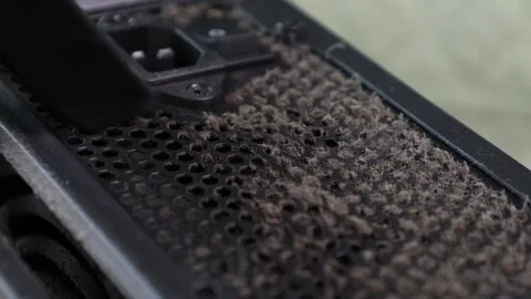 Electronic unit cooling grill clogged with dust, cleaning dust from computer Stock Footage 305260909