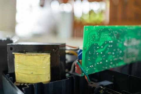 Electronic waste. Electrical transformer in UPS, power backup battery. Stock Photos