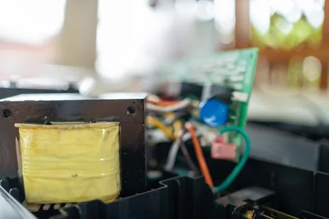Electronic waste. Electrical transformer in UPS, power backup battery. Stock Photos