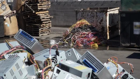 Electronic waste in scrap yard pan up 4K Stock Footage 100842336