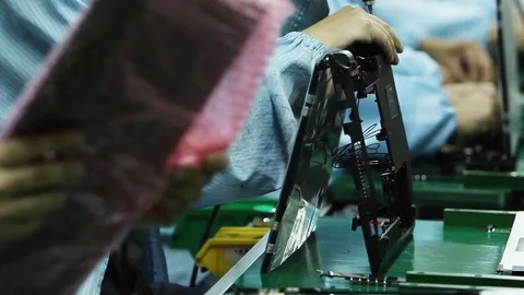 Electronics Assembly Line Workers Assembling Laptop Computers in Modern Factory Stock Footage 86627608