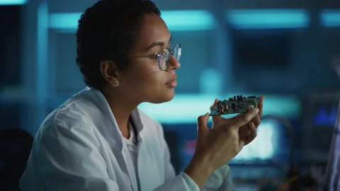 Electronics Development Facility Scientist Inspecting Motherboard Stock Footage 147048191