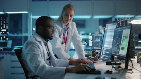 Electronics Development Facility Tea of Scientists Working Video stock 147047320