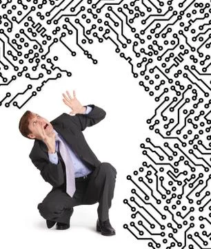 Electronics devour the frightened man Foto stock