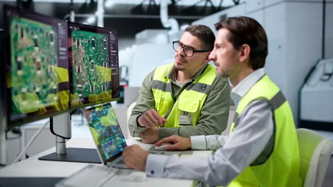 Electronics Engineer And Technician Review Multilayer PCB Layout Stock Footage 346327835