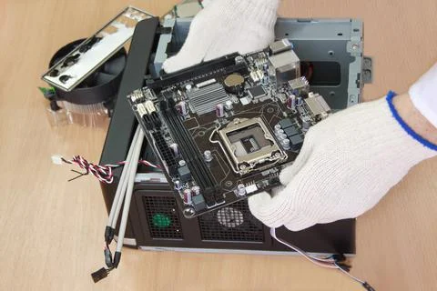 Electronics engineer assembly personal computer. Stock Photos