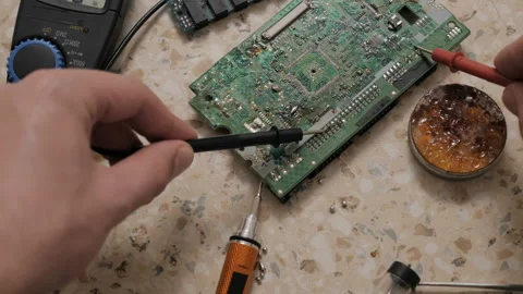 Electronics Engineer Works With Motherboard. Stock Footage 129077840
