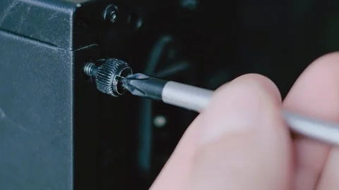 Electronics fix, hand with screwdriver Stock Footage 96107515
