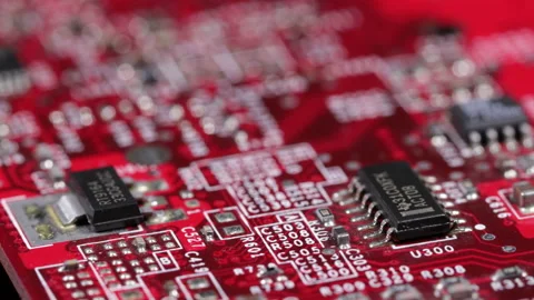 Electronics industry computer processor and transistors on red circuit board wit Stock Footage 141347111